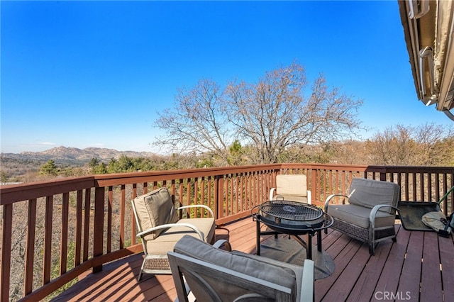 1430 Sequoia Dr, Lake Arrowhead, CA 92352 - wooden deck with a mountain view and an outdoor hangout area