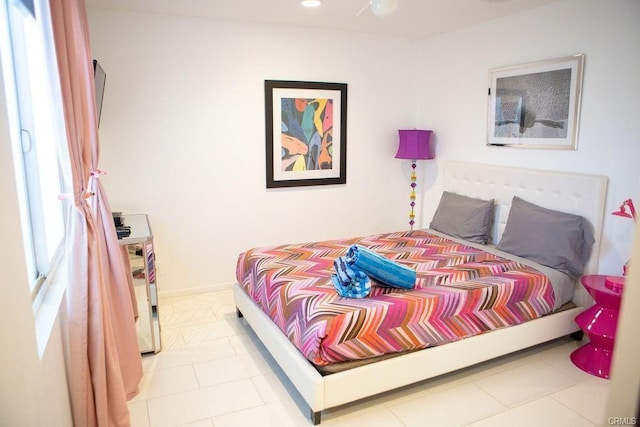 bedroom with light tile patterned flooring