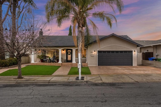 ranch-style house featuring a garage