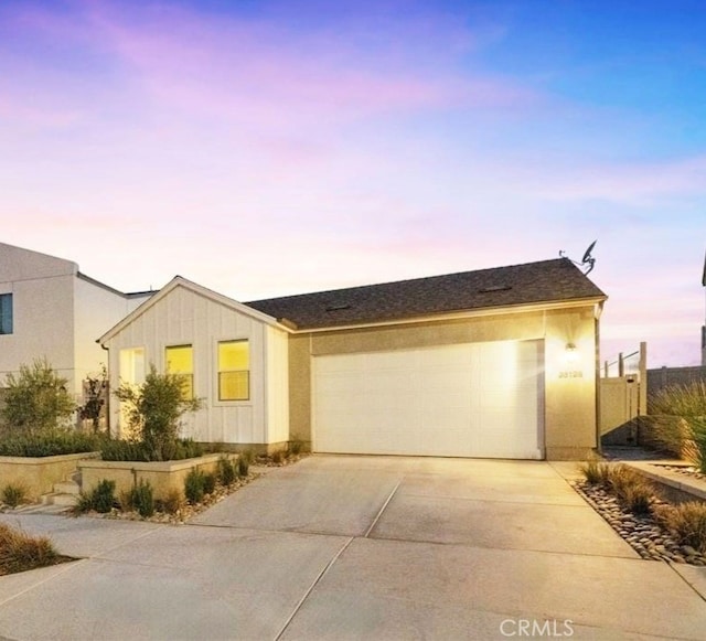 view of front of home with a garage