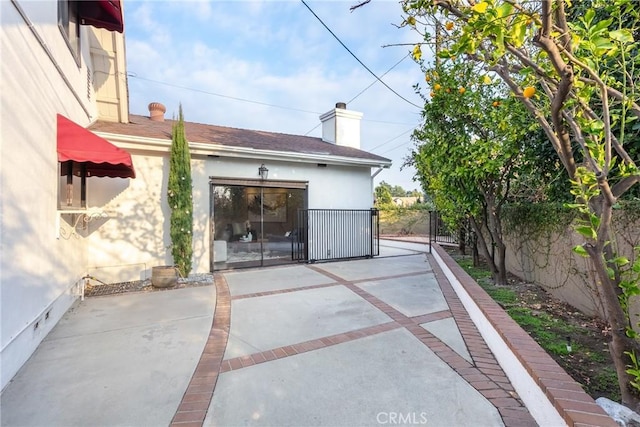 rear view of house with a patio area