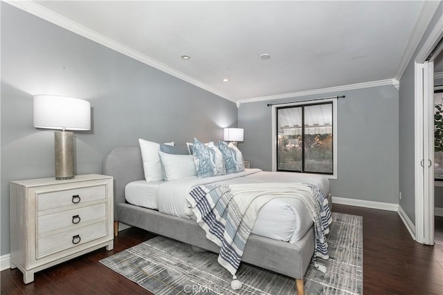 bedroom with dark hardwood / wood-style flooring and crown molding