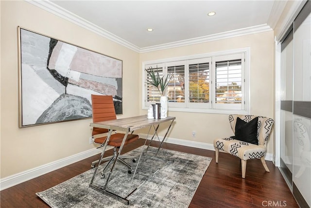 office area with ornamental molding and dark hardwood / wood-style floors