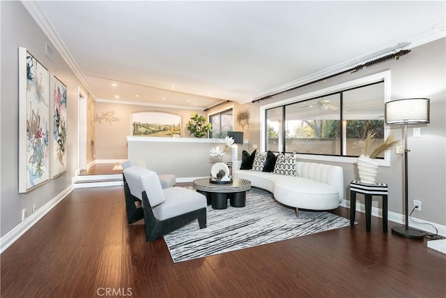 living room with ornamental molding and dark hardwood / wood-style floors