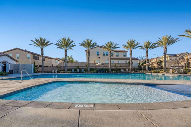 view of pool featuring a patio area