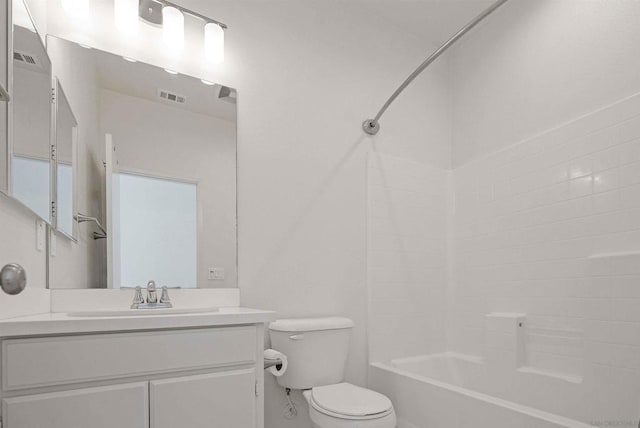 full bathroom featuring vanity, toilet, and bathing tub / shower combination