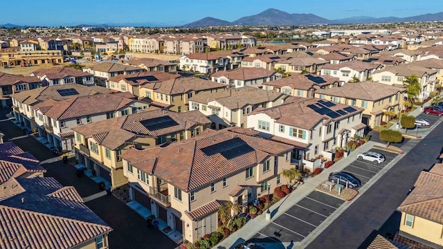 birds eye view of property featuring a mountain view