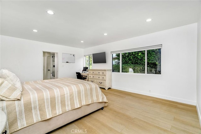 bedroom featuring light hardwood / wood-style floors