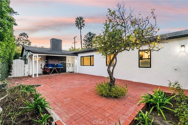 exterior space with a patio