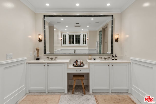 bathroom featuring vanity and ornamental molding