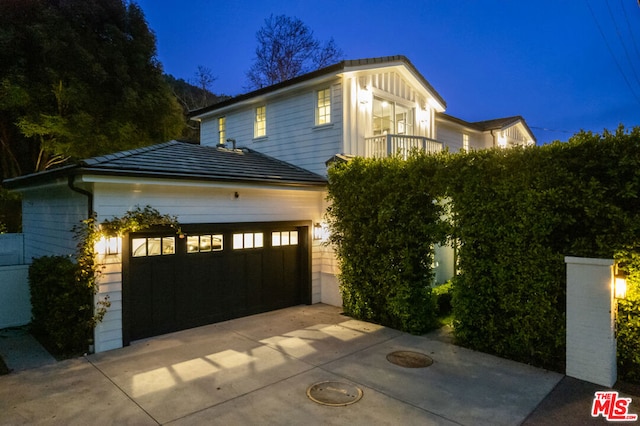 view of front of home with a garage