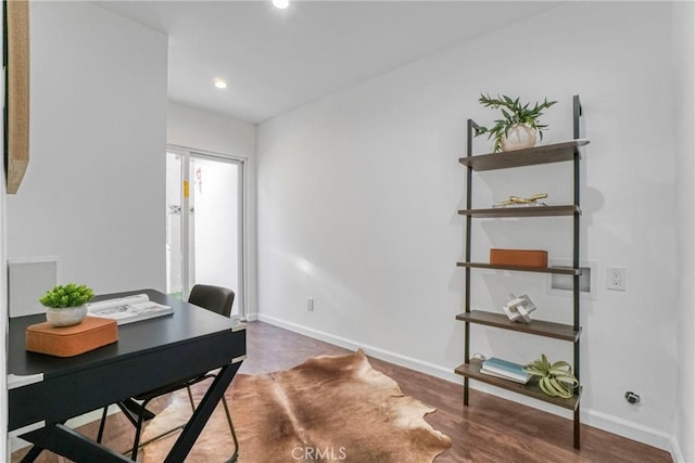 office space featuring dark wood-type flooring