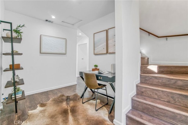 home office with dark wood-type flooring