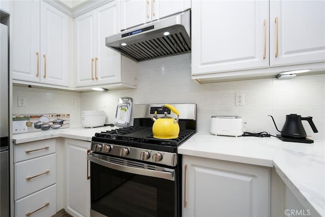 kitchen with white cabinetry, stainless steel range with gas cooktop, and tasteful backsplash