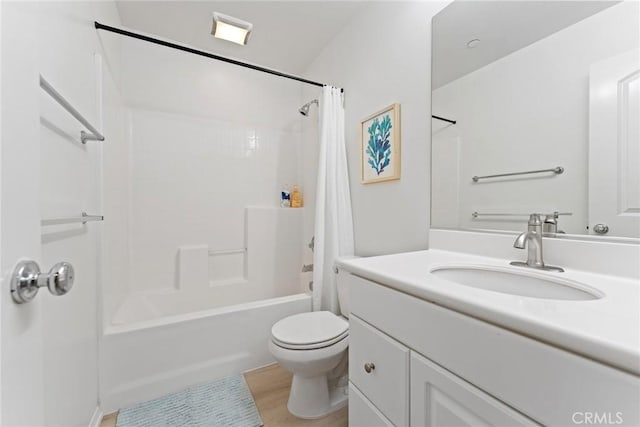 full bathroom with vanity, hardwood / wood-style flooring, shower / bath combination with curtain, and toilet