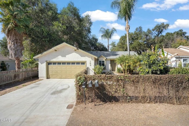 single story home featuring a garage