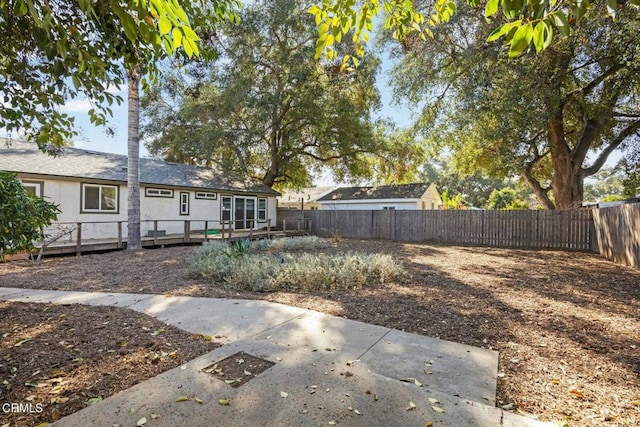 view of yard featuring a deck