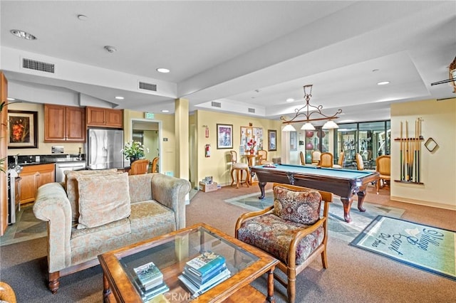 rec room featuring billiards, light carpet, and a tray ceiling