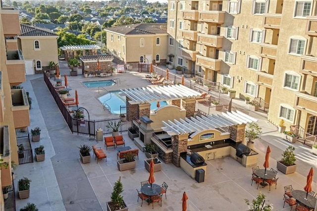 view of swimming pool featuring a pergola