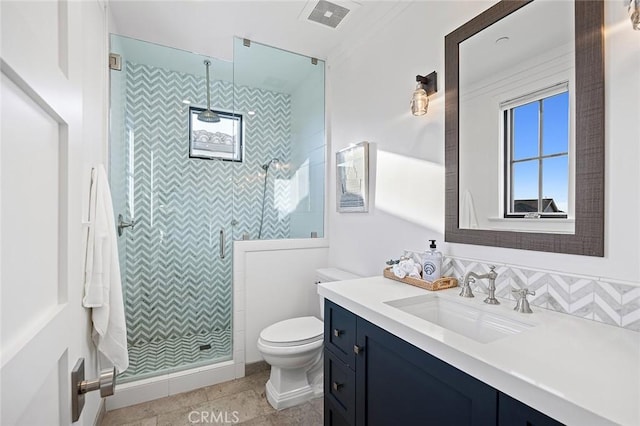 full bathroom with toilet, visible vents, and walk in shower