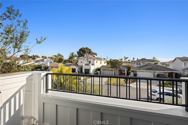 balcony featuring a residential view