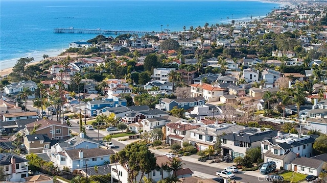 birds eye view of property featuring a water view and a residential view