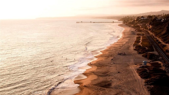 property view of water featuring a view of the beach