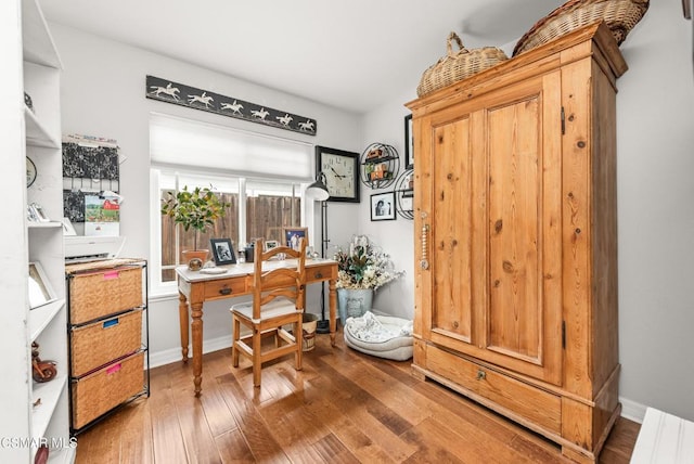 office space featuring hardwood / wood-style floors