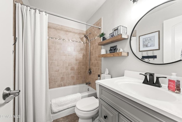 full bathroom with vanity, toilet, and shower / bath combo