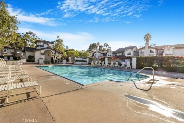 view of pool featuring a patio area