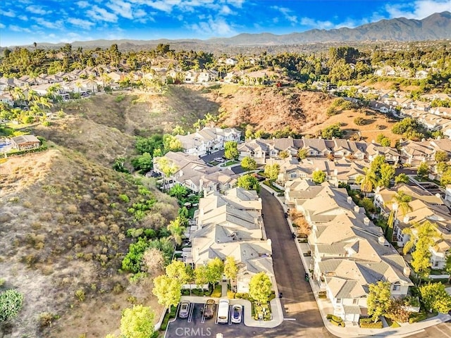 drone / aerial view featuring a mountain view