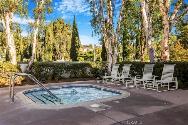 view of swimming pool featuring a patio