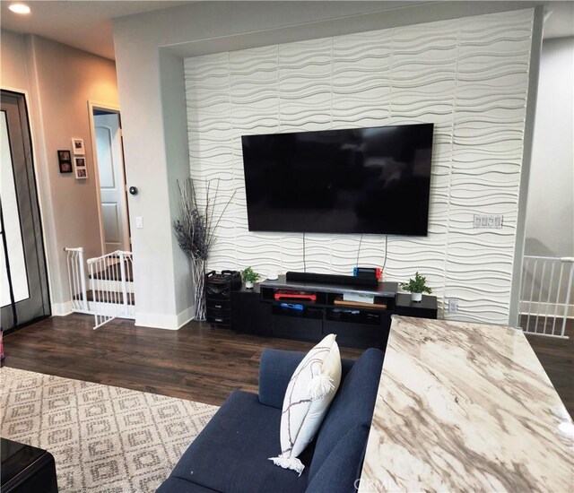 living room featuring dark wood-type flooring