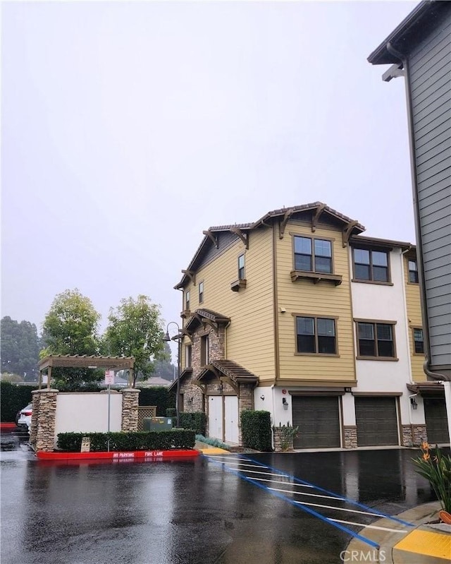 view of building exterior featuring a garage