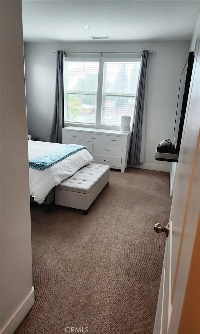 bedroom featuring carpet flooring