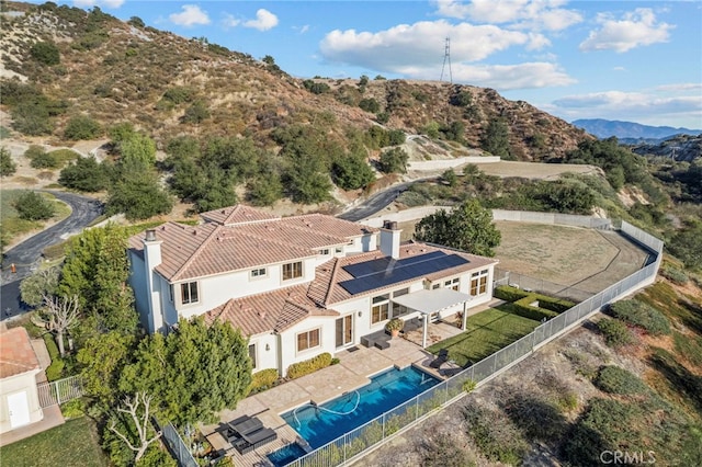 bird's eye view with a mountain view