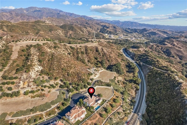 aerial view featuring a mountain view