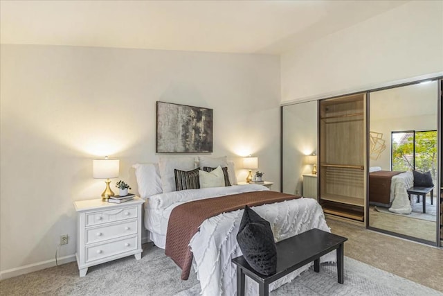 carpeted bedroom featuring a closet