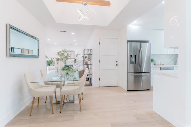 dining room featuring light wood-type flooring