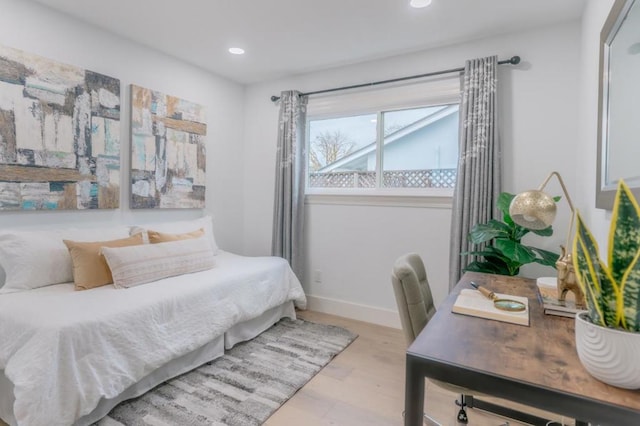 bedroom featuring light wood-type flooring