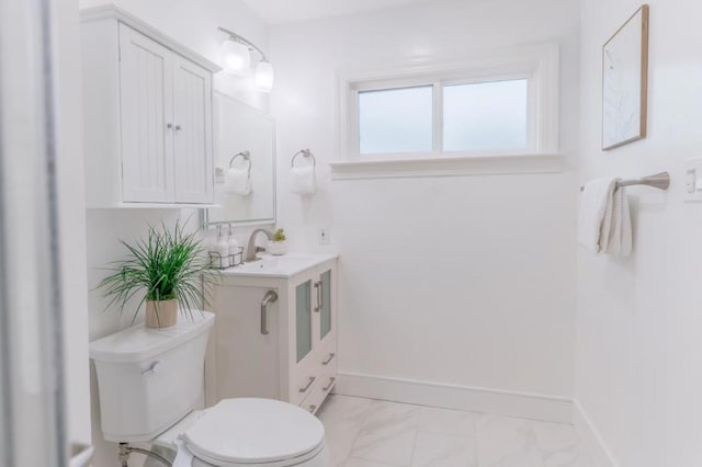 bathroom with sink and toilet