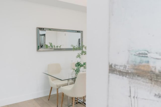 dining space with light wood-type flooring