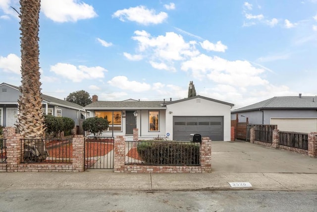 ranch-style home featuring a garage