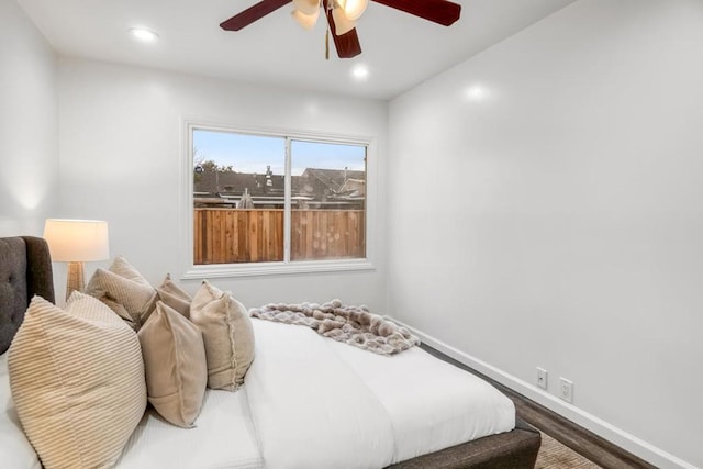 bedroom featuring ceiling fan and wood-type flooring