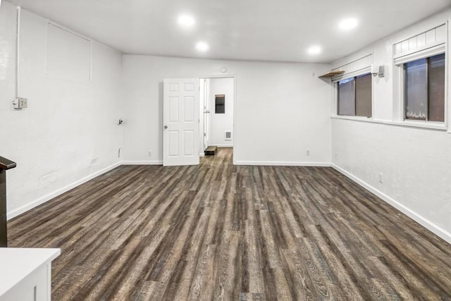 basement featuring dark hardwood / wood-style floors