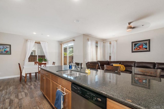 kitchen with dark wood-type flooring, a sink, open floor plan, brown cabinets, and dishwasher