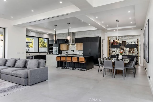 living room with a raised ceiling