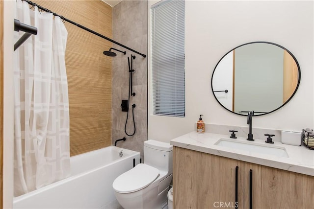 full bathroom featuring shower / tub combo, vanity, and toilet