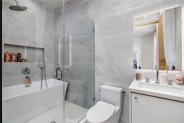 full bathroom with vanity, toilet, tile walls, and plus walk in shower