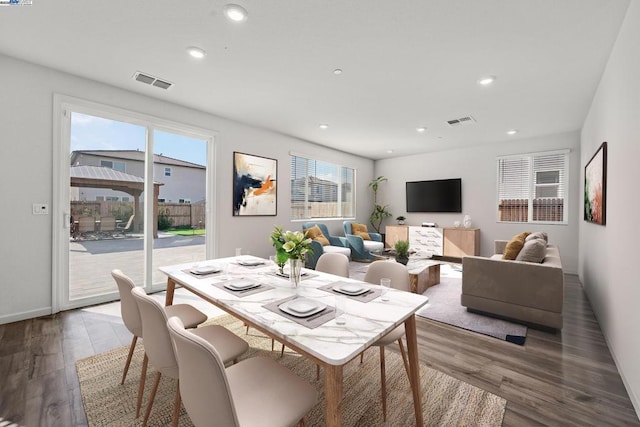 dining room with hardwood / wood-style floors